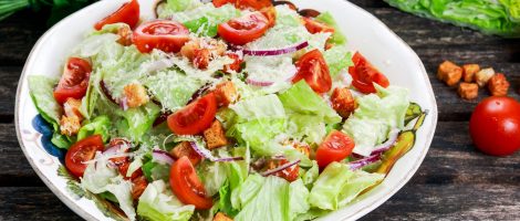 Fresh healthy Classic Caesar salad on plate.